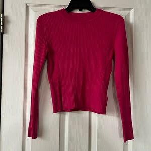 Divided fuchsia knit long sleeve fitted top
